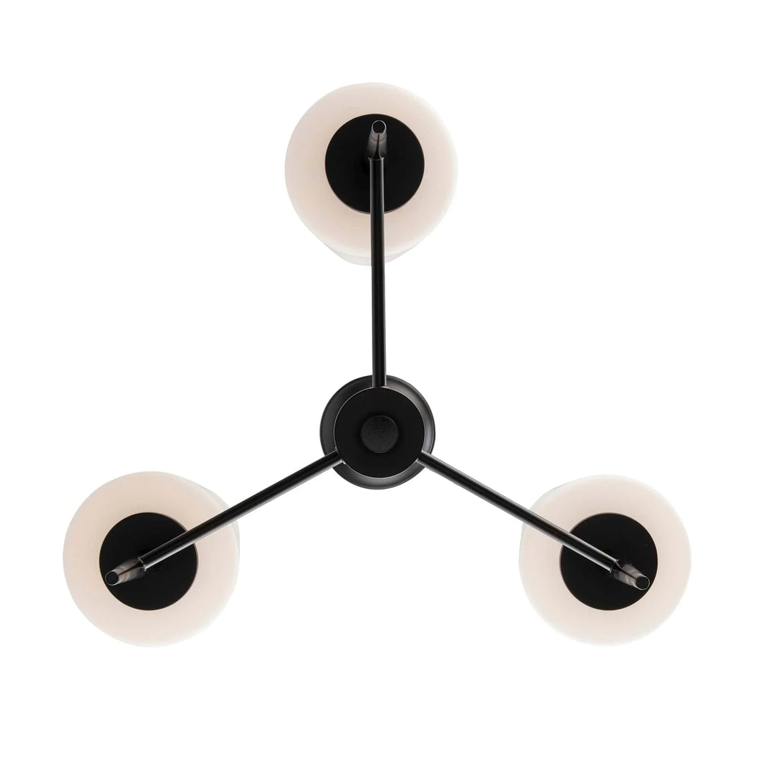 Three-light black ceiling fixture with round diffusers for modern residential or commercial lighting