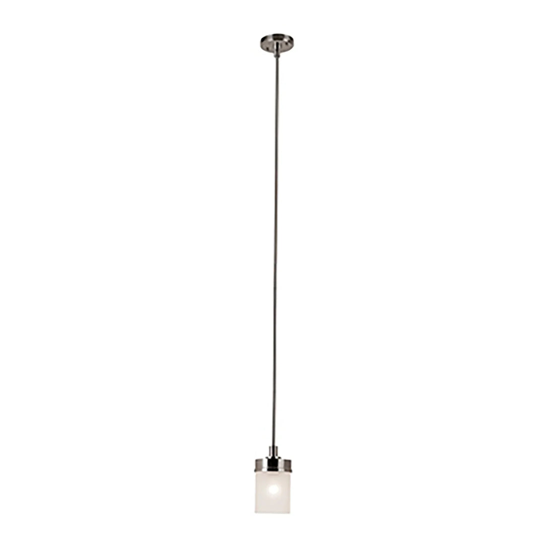 Mini pendant light with brushed nickel finish and cylinder glass shade for kitchen or dining area