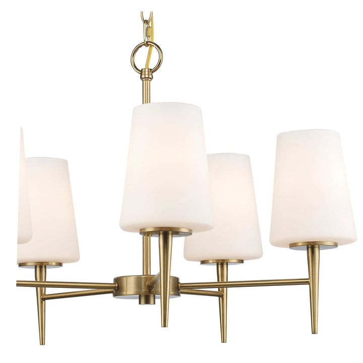 Five-light chandelier with white tapered glass shades and antique gold frame for dining room lighting