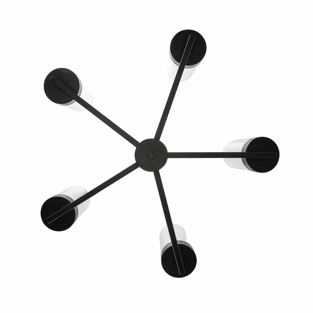 Modern candelabra chandelier with six black and white cylindrical lights for dining room lighting