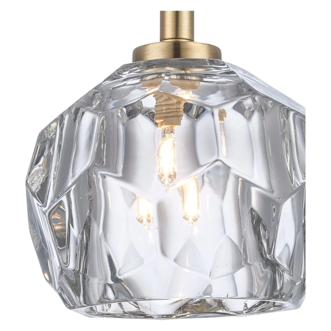 Semi-flush ceiling light with faceted crystal shade and antique gold finish for modern indoor lighting