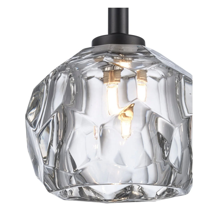 Semi-flush ceiling light with faceted crystal shade and black fixture for modern indoor lighting