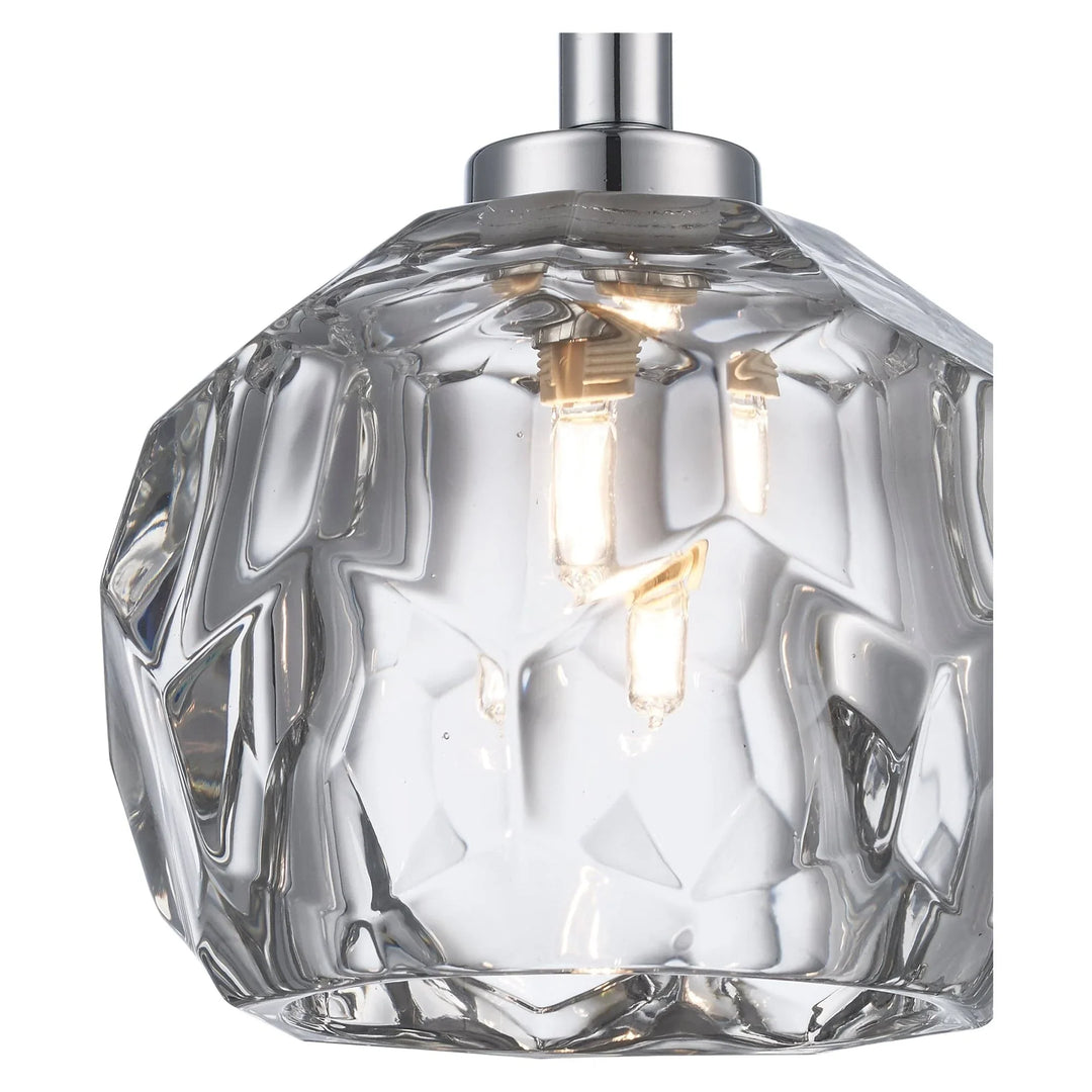Semi-flush ceiling light with faceted crystal shade and polished chrome finish for modern interiors