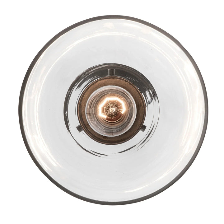 Mini pendant light with exposed Edison bulb and clear glass shade for modern interior lighting