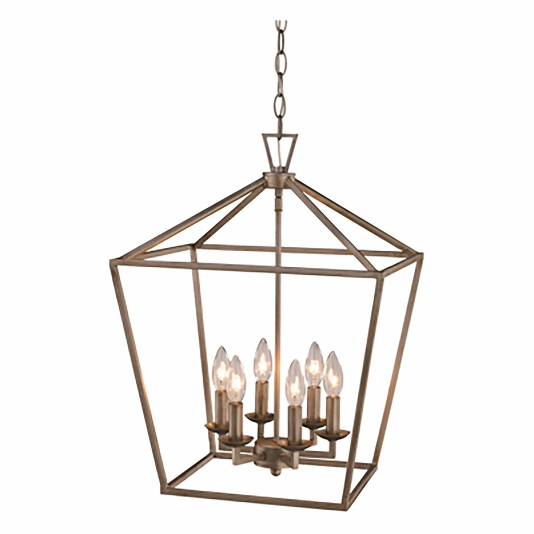 Pendant light fixture with eight candle-style bulbs in a geometric metal frame for dining rooms
