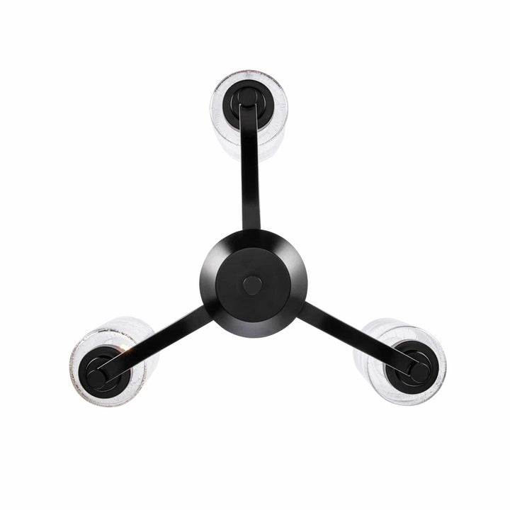 Three-light ceiling fixture with black metal arms and clear glass shades for modern interior lighting