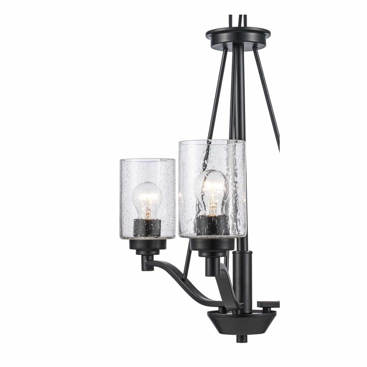 Three-light black pendant chandelier with clear glass shades for modern dining room lighting